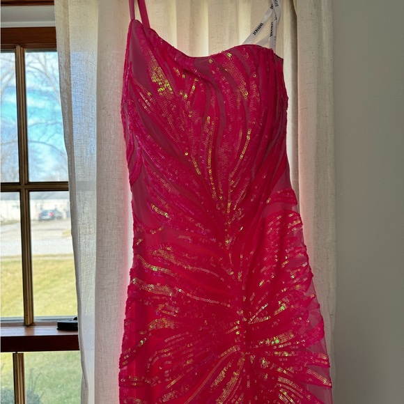 This prom dress is gorgeous! Hot pink…Size 2.. Jovani. - Picture 7 of 9